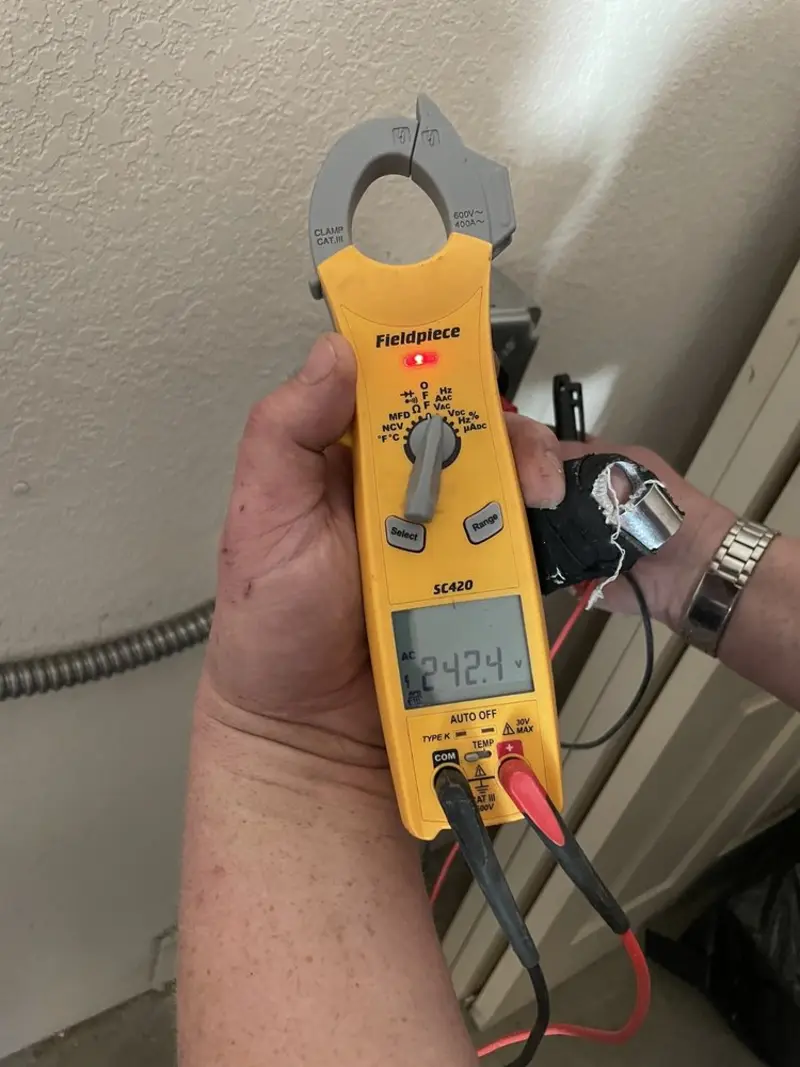 Voltage testing with clamp meter during Circuit Breaker Repair in South Lebanon